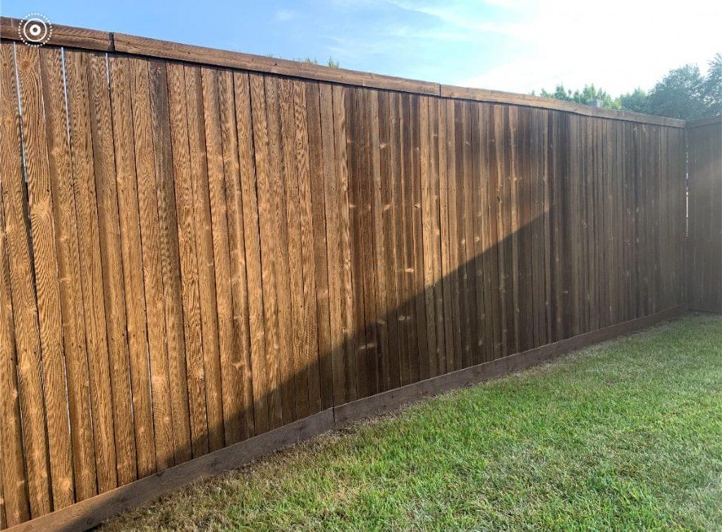 Fence with knotholes outside-min will stain cover the knots in the fence